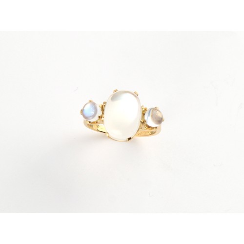 61 - An unmarked high carat yellow gold moonstone three stone ring, the largest moonstone measuring appro... 