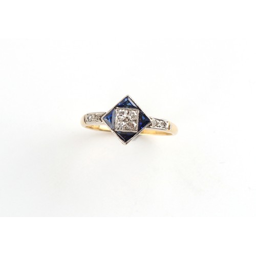 119 - An Art Deco yellow unmarked gold sapphire & diamond ring, the diamond shaped millegrain setting with... 