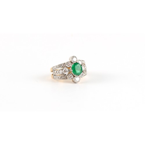 121 - A French 18ct yellow gold emerald & diamond ring, the oval cut emerald weighing approximately 0.93 c... 