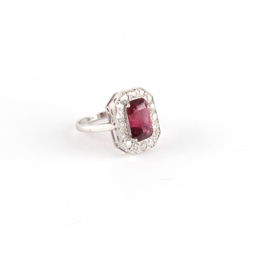 89 - An Art Deco style unmarked white gold or platinum rubellite tourmaline & diamond ring, the octagonal... 