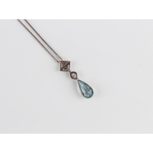 54 - An aquamarine & diamond pendant on 14ct white gold chain necklace, the pear shaped cut aquamarine we... 