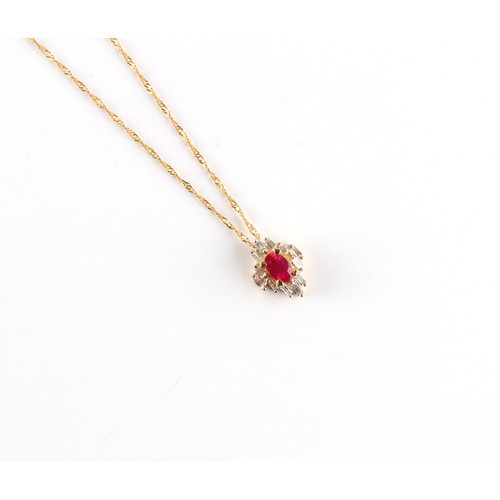 21 - En suite with the preceding lot - a 14ct yellow gold ruby & diamond pendant on chain necklace, the c... 