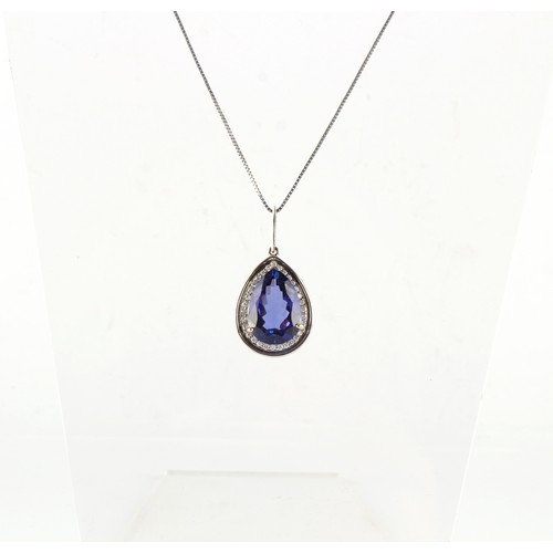 112 - An 18ct white gold large tanzanite & diamond pear shaped pendant on 18ct white gold chain necklace, ... 