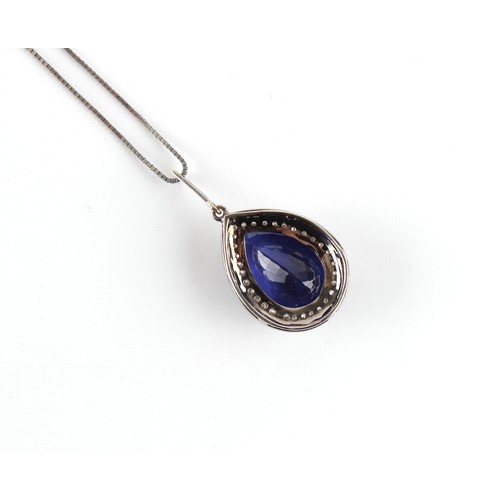 112 - An 18ct white gold large tanzanite & diamond pear shaped pendant on 18ct white gold chain necklace, ... 