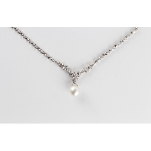 139 - An 18ct white gold large single pearl & diamond necklace, the pearl measuring approximately 11 by 11... 