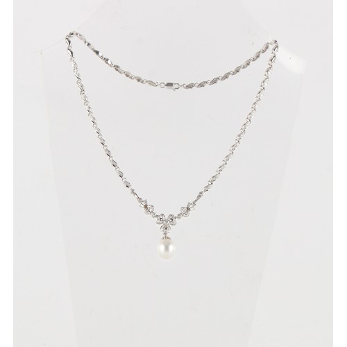 139 - An 18ct white gold large single pearl & diamond necklace, the pearl measuring approximately 11 by 11... 