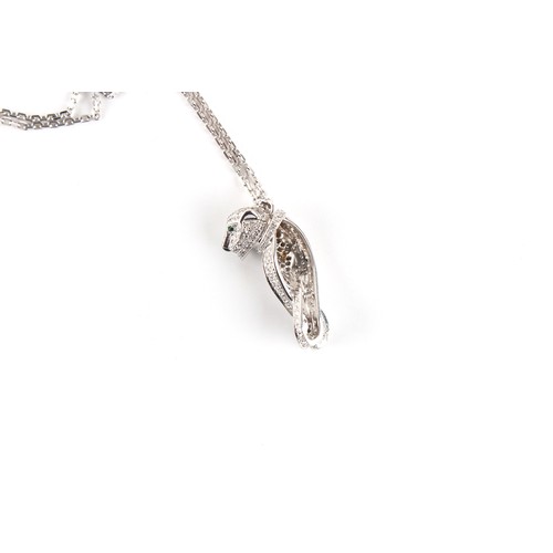 141 - Cartier - an 18ct white gold diamond emerald & sapphire leopard pendant on 18ct white gold chain nec... 