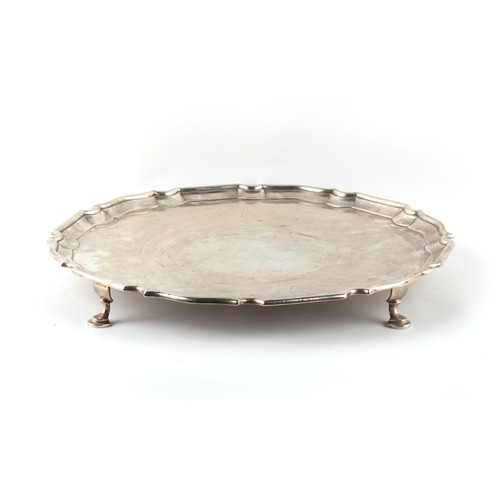 230 - Property of a lady - a large late Victorian silver salver or waiter, with hoof feet, Charles Stuart ... 