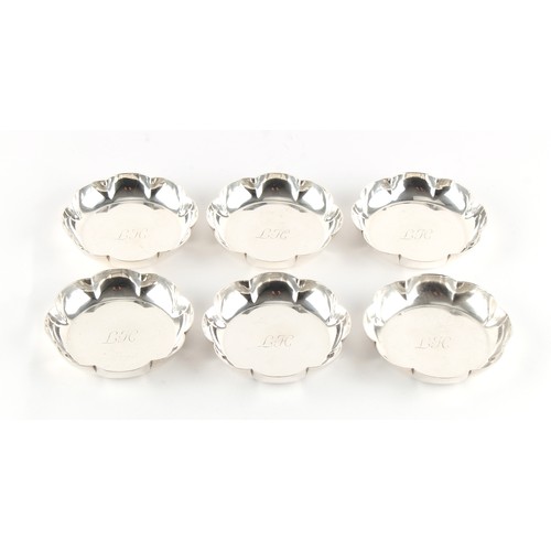 236 - Property of a lady - a set of six silver petal rimmed small dishes, each with engraved initials to c... 