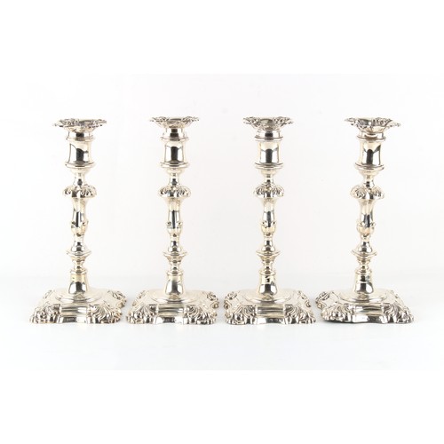 267 - Property of a deceased estate - a matched set of four early Victorian silver candlesticks, the bases... 