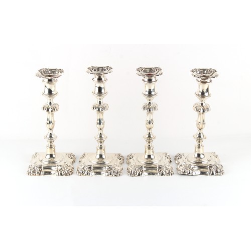 267 - Property of a deceased estate - a matched set of four early Victorian silver candlesticks, the bases... 