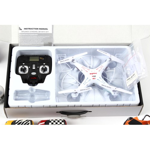 284 - Property of a lady - a boxed Syma X5C Explorers Remote Control Quadcopter; together with a quantity ... 