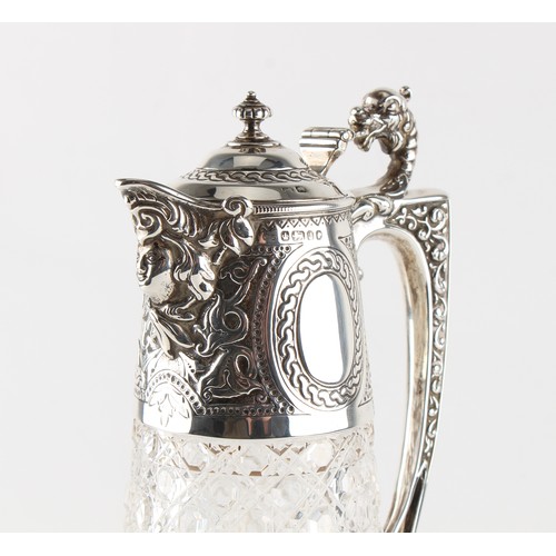 259 - Property of a lady - a Victorian silver mounted cut glass claret jug, of tapering cylindrical form, ... 