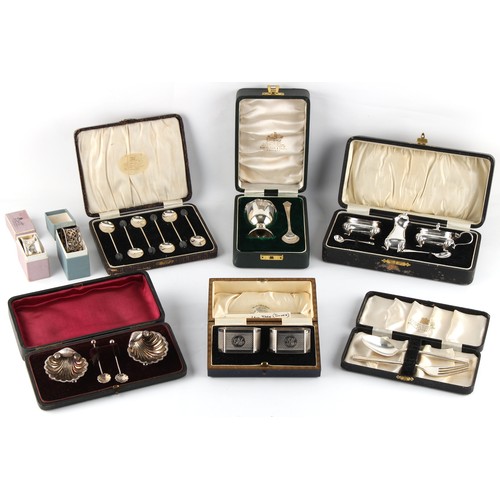 202 - Property of a lady - a group of eight boxed or cased silver items or sets, including a condiment set... 