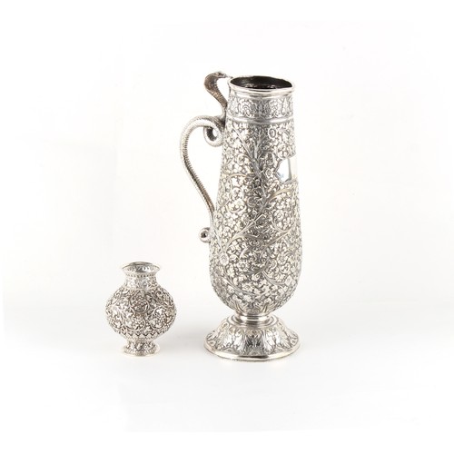 245 - Property of a deceased estate - a small Indian silver baluster vase by Oomersee Mawjee, Bhuj, 3.75in... 