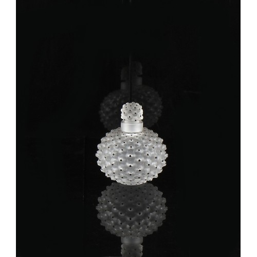 311 - Lalique - a Cactus glass scent bottle, etched signature, 3.95ins. (10cms.) high.