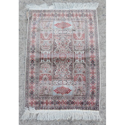 280 - Property of a gentleman - a finely woven silk small rug, 36 by 24ins. (91 by 61cms.).