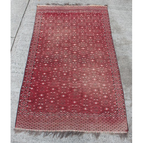 283 - Property of a deceased estate - a Turkoman Yomut kelim carpet, 152 by 86ins. (387 by 220cms.).