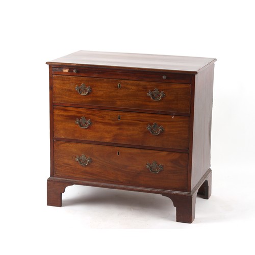 306 - Property of a deceased estate - a small George III mahogany chest of three long graduated drawers, w... 