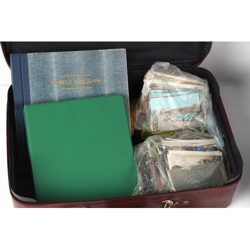 17 - Property of a deceased estate - two suitcases containing assorted stamps, postcards, cigarette cards... 