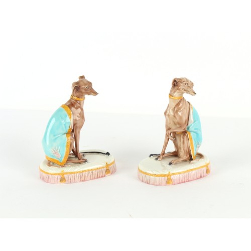 198 - Property of a gentleman - a pair of late 19th century Continental coloured bisque porcelain models o... 