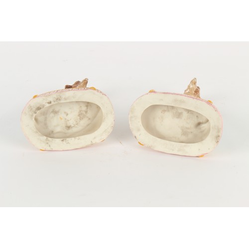 198 - Property of a gentleman - a pair of late 19th century Continental coloured bisque porcelain models o... 