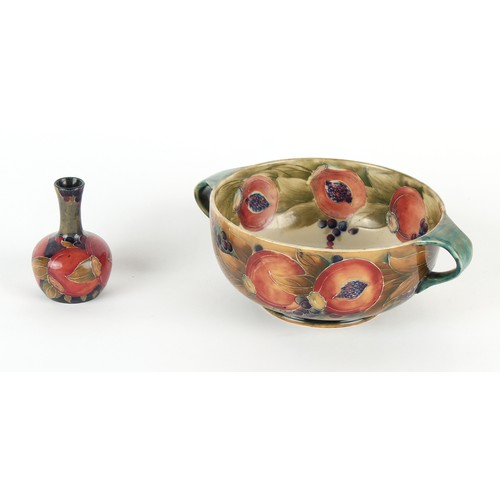 200 - Property of a lady - an early Moorcroft pomegranate two handled bowl, some crazing & surface scratch... 