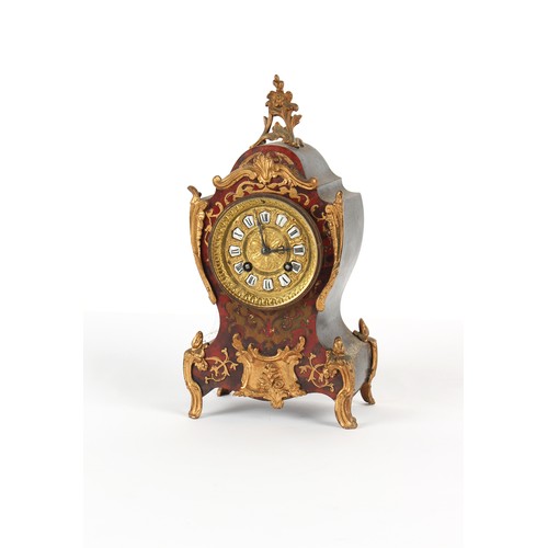 256 - Property of a gentleman - a late 19th century French Boulle style mantel clock, the two train moveme... 