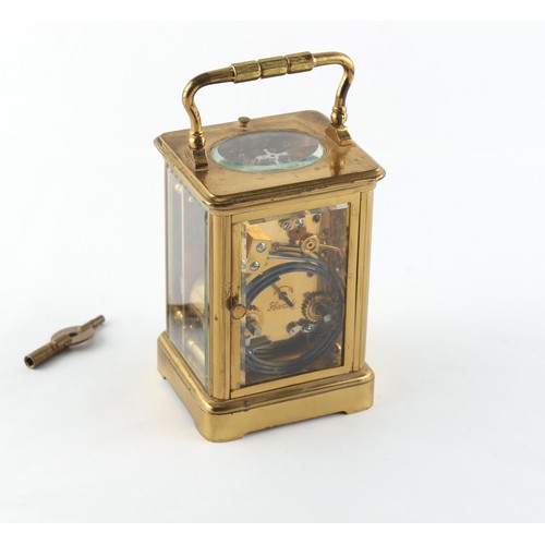 251 - Property of a lady - a late 19th century French brass corniche cased carriage clock, striking the ho... 