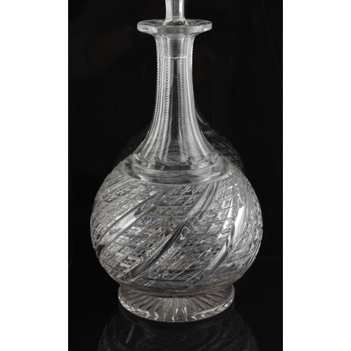 162 - A good pair of large cut glass decanters with stoppers, early 20th century, 15.2ins. (38.5cms.) high... 