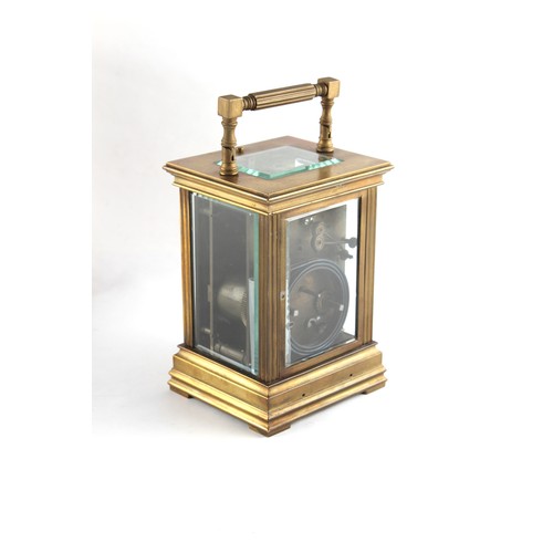 253 - A large late 19th century brass pillars cased grande sonnerie carriage clock, with repeat button, wi... 