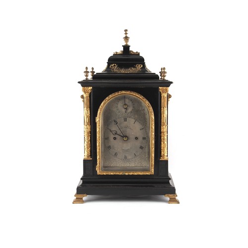 262A - Property of a lady - a late Victorian ormolu mounted ebonised cased table clock, the 8-day twin fuse... 