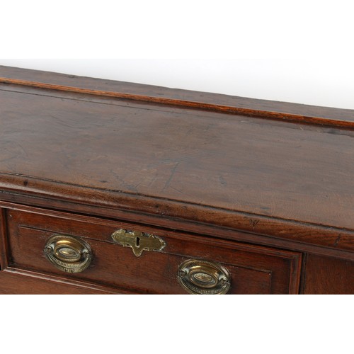 324 - Property of a gentleman - an 18th century George III oak pot board dresser, of good colour, with thr... 