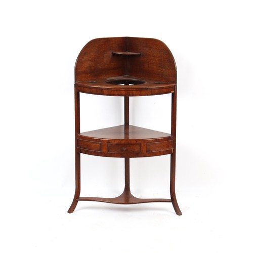 304 - Property of a gentleman - an early 19th century George IV mahogany bow-fronted corner washstand; tog... 