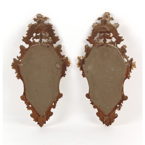 346 - Property of a lady - a pair of late 19th / early 20th century Florentine carved giltwood wall mirror... 