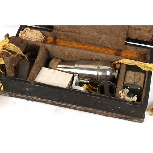 243 - Property of a gentleman - a scarce Ferrotype Wonder Cannon camera, in original wooden box with acces... 