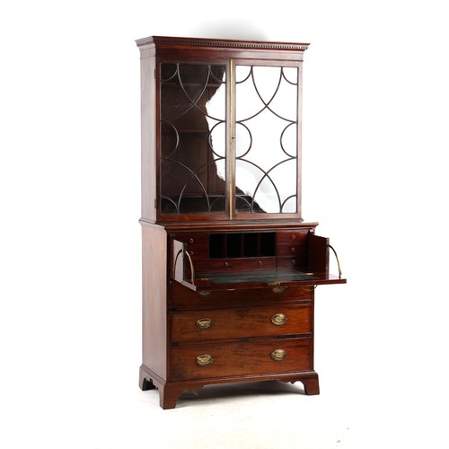 339 - Property of a lady - a George III mahogany secretaire bookcase, with dentil cornice above two tracer... 