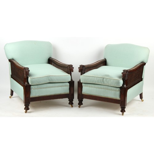 337 - Property of a lady - a good early 20th century bergere three piece suite comprising a pair of armcha... 