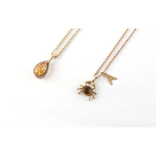 78 - Property of a deceased estate - a 9ct yellow gold smoky quartz pendant and a 9ct gold letter 'A' pen... 