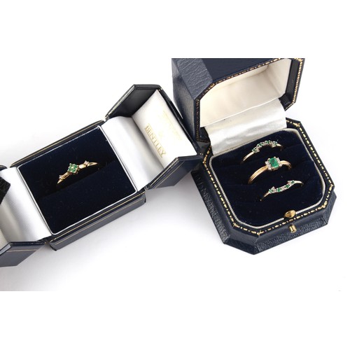 161 - Property of a lady - a set of three 9ct yellow gold emerald & diamond interlocking rings, size S, in... 