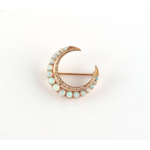 117 - A 14ct yellow gold opal & diamond crescent brooch, 27mm across.