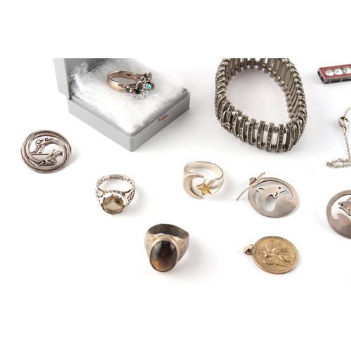 85 - Property of a gentleman - a bag containing assorted silver & white metal jewellery items including a... 