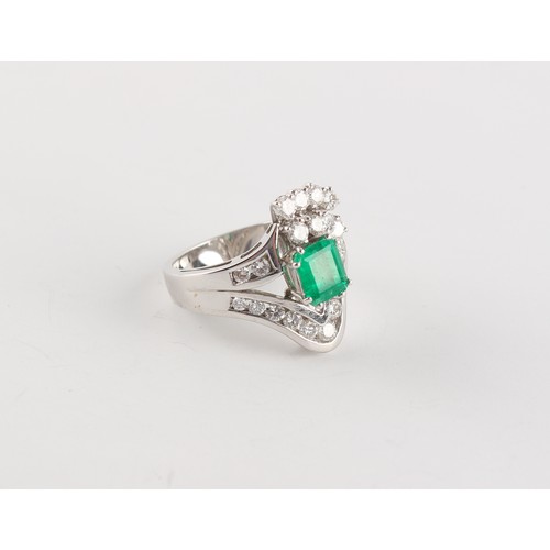 179 - Property of a gentleman - an 18ct white gold emerald & diamond ring, the octagonal cut emerald weigh... 