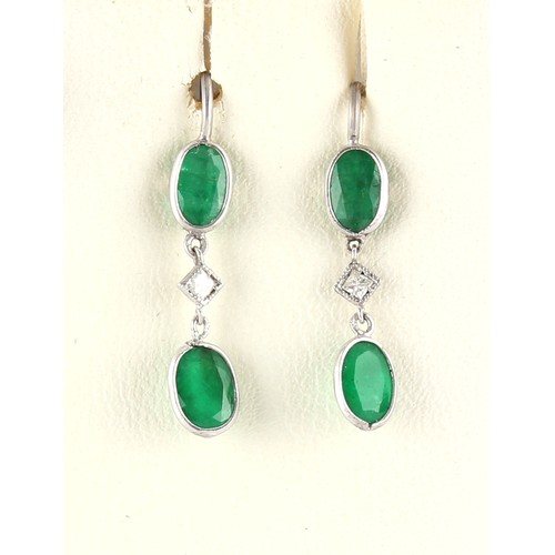 91 - A pair of emerald & diamond pendant earrings, each approximately 24mm long (2).