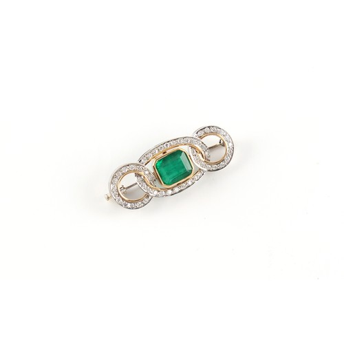 92 - An unmarked white & yellow gold emerald & diamond interlinking loops brooch, the emerald weighing ap... 