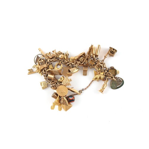 96 - Property of a gentleman - a 9ct gold charm bracelet, with 48 charms including an 1859 American gold ... 