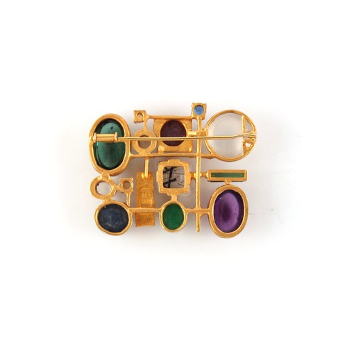 275 - A modernist 18ct yellow gold multi gem set brooch, the stones including cabochon ruby, emerald, sapp... 