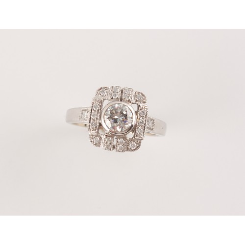 62 - An Art deco style white gold or platinum diamond ring, the round brilliant cut centre stone weighing... 