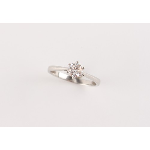 157 - A platinum diamond single stone ring, the round brilliant cut diamond weighing approximately 0.50 ca... 