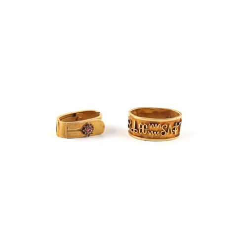 131 - Property of a lady - an unmarked yellow gold (tests 18ct) cravat or scarf ring, with hieroglyphs, ap... 